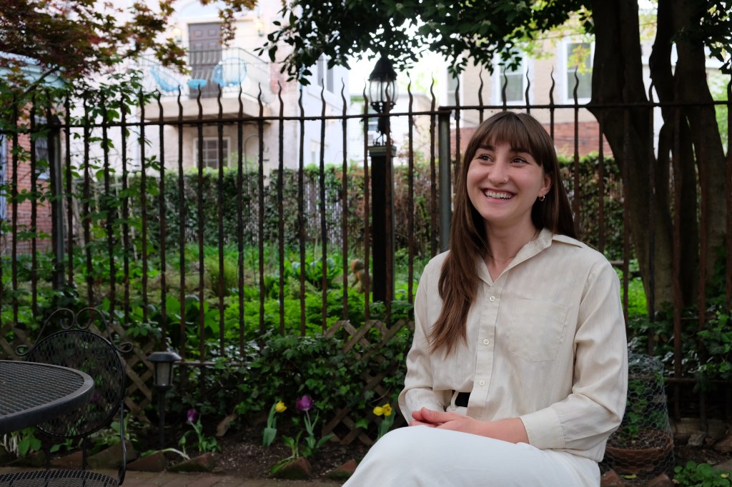 smiling existential therapist who is providing compassionate mental healthcare, therapy, counseling